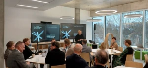 Asta Pundziene is presenting in front of an audience during a strategic session