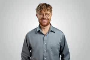 Lukas Geryba, Head of the KTU Open Innovation Centre against gray background