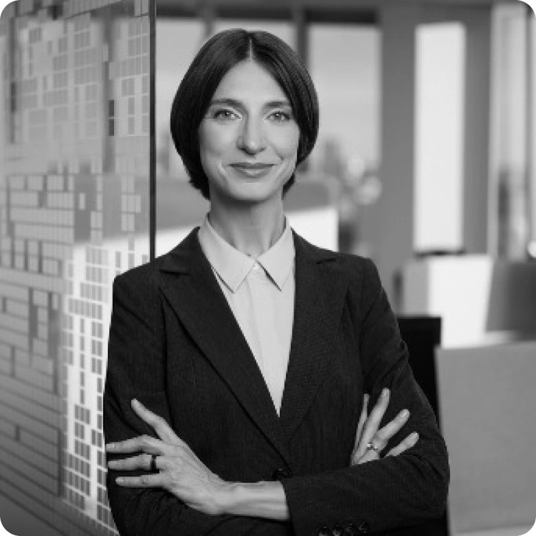 Monika Paulė, Head of Innovation Agency in a blurred office background