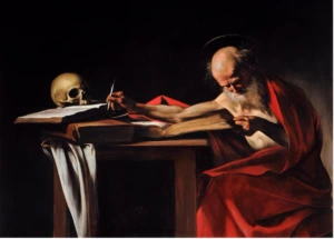 A dramatic Baroque painting of an elderly bearded man in a red robe writing at a desk beside an open book and a human skull, illuminated by strong light against a dark background.
